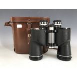 A cased pair of Janik 10 x 50 binoculars