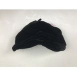 A 1940s Jacoll black velvet skull cap