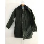 An Outdoor UK Ltd wax jacket, in Barbour packaging, size XS