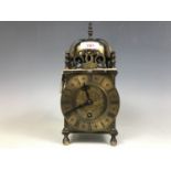 A mid-20th Century Smiths reproduction lantern clock, 25 cm