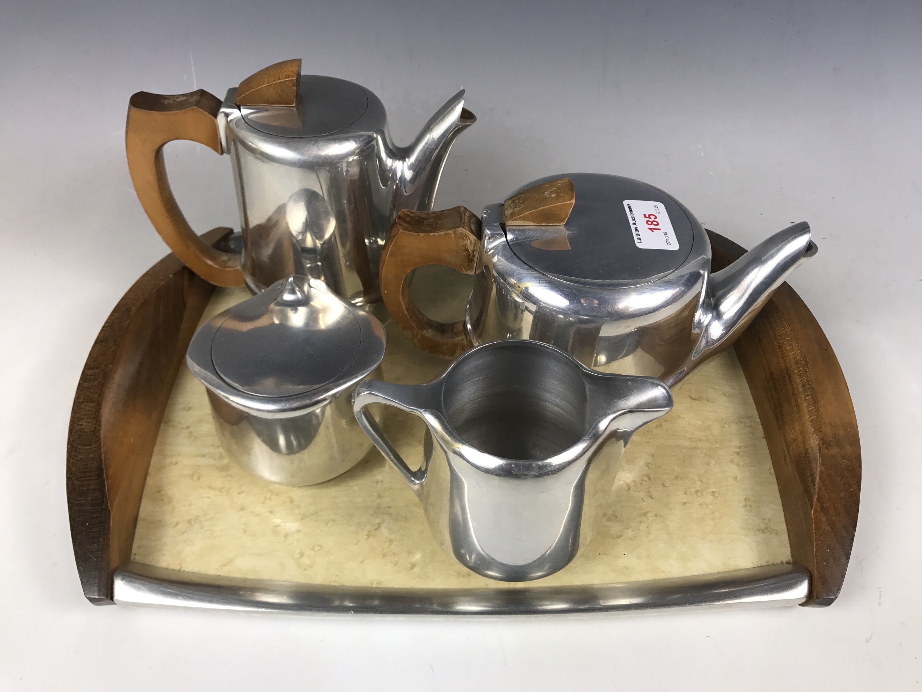 A five-piece Picquot ware tea set