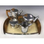 A five-piece Picquot ware tea set