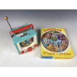 A Tokyo Olympic 1964 jigsaw and musical toy TV