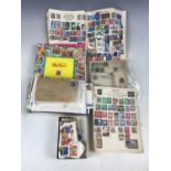 Sundry stamp albums including a quantity of loose stamps etc