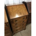 A reproduction walnut fall-front bureau of diminutive proportion, 53 x 45 x 90 cm