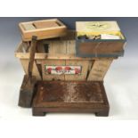 Sundry wooden collectables including two vintage fruit crates, a mallet, draughts pieces and a