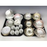 A quantity of cabinet cups and saucers including Royal Doulton, Minton and Royal Worcester etc