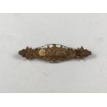 A Victorian 9ct gold bar brooch, 2.3g