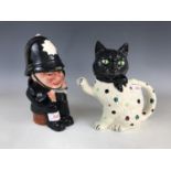 A Shorter and Son novelty cat tea pot together with a Policeman water jug, 21 cm
