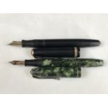 A Parker Duofold fountain pen together with one other a Conway Stewart 75 in marbled green