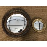 Two vintage gilt-framed circular convex wall mirrors, 51 cm and 24 cm diameter respectively