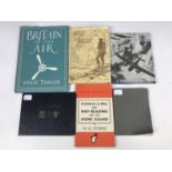 A small quantity of books including Verse or Valour, Britain in the Air and Raid notebook etc