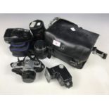 A Pentax ME Super camera with SMC Pentax-A 1:1.7 50mm lens and accessories including a Tamron 1:2.