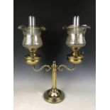 A reproduction Victorian two-branch columnar oil lamp, having duplex burners, funnels and lustrous