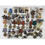 A large quantity of Soviet medals and insignia