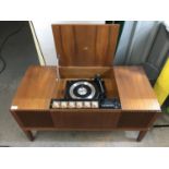 A 1960s HMV record player and radiogram, 96 x 44 x 51 cm