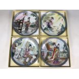 Four boxed Chinese porcelain plates