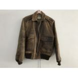 A St Johns Bay brown leather jacket, size 44R