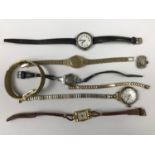 Vintage wristwatches, including a 1940s lady's silver cased wristwatch with white enamelled face and