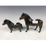 A Beswick Exmoor pony figurine together with a Beswick Shetland pony figurine