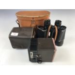 A Conway Synchronised box camera together with a set of Denhill De Luxe 10-50 binoculars