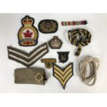 Sundry items of cloth insignia and lanyards