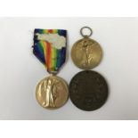 A First World War Victory medal awarded to 25335 Pte J Coleman of the Border Regiment, together with