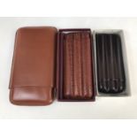 Three hide cigar cases (boxed as-new)