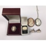 Vintage white-metal and carved cameo jewellery, including a mother of pearl pendant brooch depicting