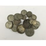 A small quantity of pre-1921 British silver coins (22g) together with a quantity of pre-1946 '