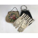 An Edwardian lady's evening bag with stylized Gothic handle and cantle, together with one further