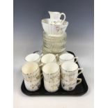 A vintage gilded white porcelain tea service