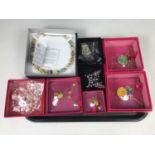 A quantity of contemporary costume jewellery in presentation boxes, including a Historic Royal
