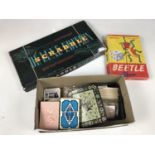 Vintage board games including Scrabble and Beetle together with a quantity of card games etc