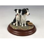 A boxed Border Fine Arts boxed figurine, James Herriot Series, The New Dog, A0601