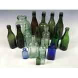 A 19th Century glass jar together with sundry chemist bottles and Carlisle glass bottles etc