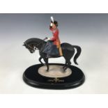 A boxed Country Artists figurine, Trooping the Colour