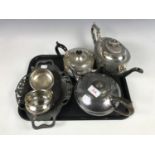 Two Victorian electroplate tea pots together with a three-piece electroplate tea service etc