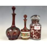 Two Victorian glass perfume bottles, together one further toiletry jar