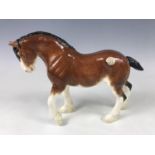 A boxed Border Fine Arts Pottery Company boxed figurine, Clydesdale Stallion, A4594