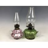 Two late Victorian glass chamber oil lamps