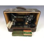 A cased Singer sewing machine