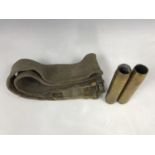 An RAF Pattern 1937 webbing belt and two Second World War 20mm aircraft cannon cartridge cases