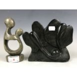 Two soapstone figurines