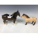 A Beswick Clydesdale horse figurine together with one other