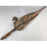 An early 20th Century lady's wooden-handled sun parasol