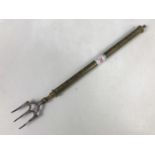A Victorian brass telescopic toasting fork