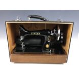 A cased 1950s Singer sewing machine