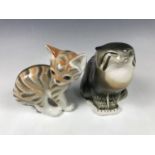 Two Lomonosov cat figurines