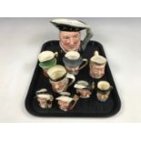 A large Royal Doulton Henry VIII character jug together with three Beswick character jugs and five